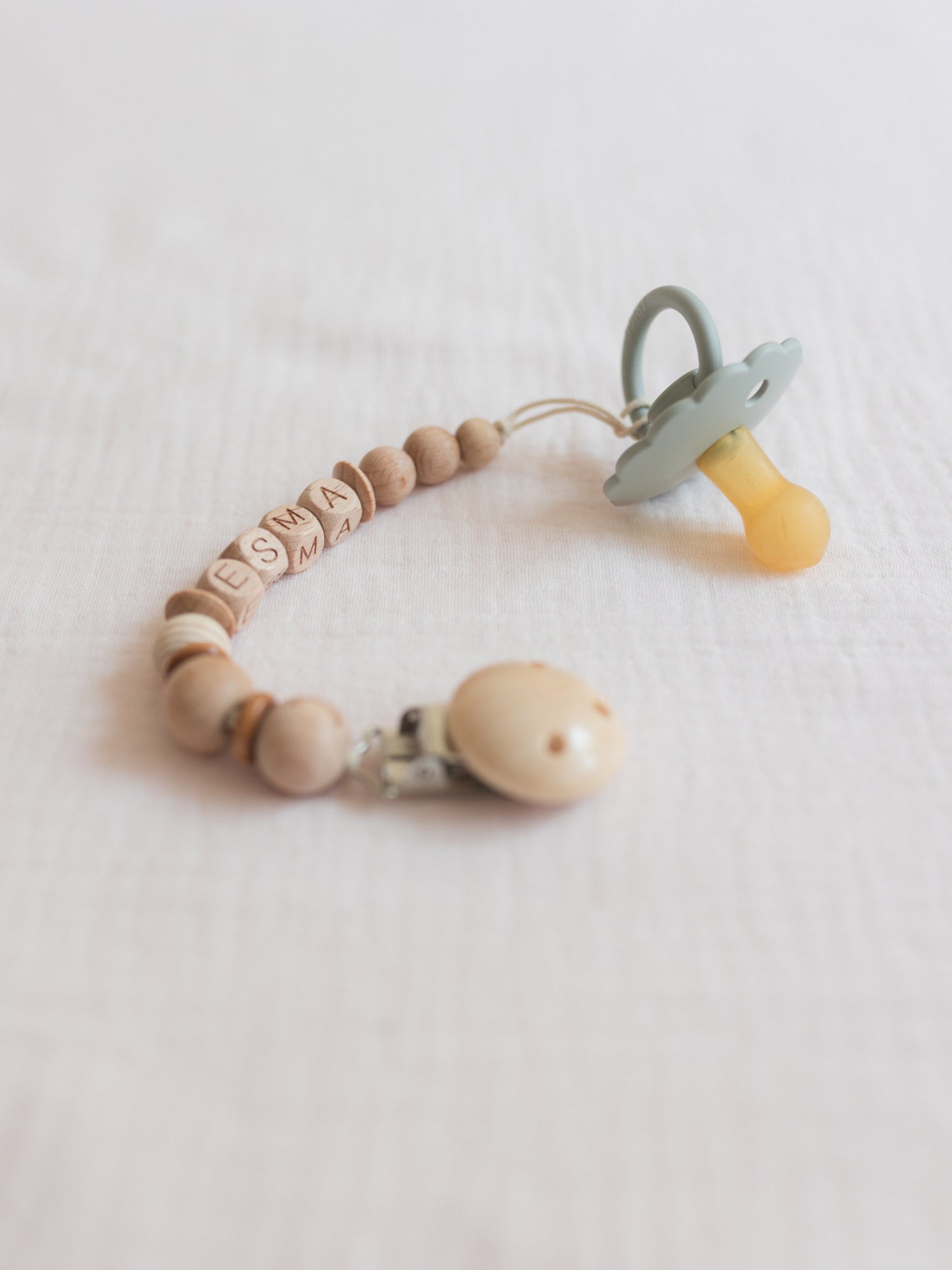 Wooden pacifier clip